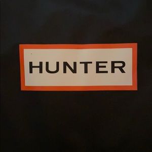 Knee high Hunter rain boots